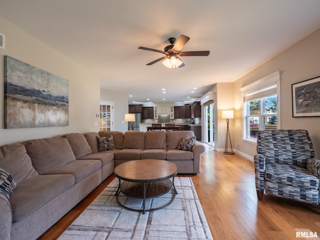 11014 N Saddlehorn Way, Dunlap, IL 61525 - living area with light wood-type flooring, a ceiling fan, and recessed lighting