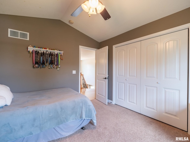 11014 N Saddlehorn Way, Dunlap, IL 61525 - bedroom featuring carpet, vaulted ceiling, a closet, and a ceiling fan