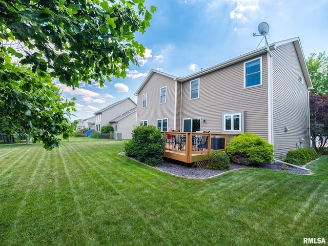 11014 N Saddlehorn Way, Dunlap, IL 61525 - rear view of house featuring a wooden deck and a yard