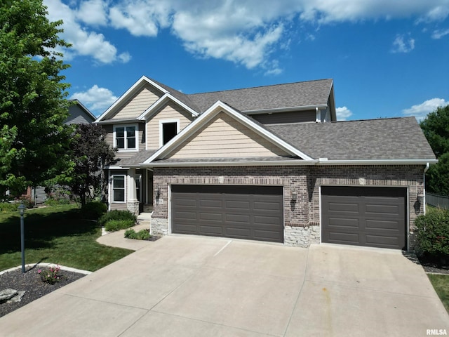 11014 N Saddlehorn Way, Dunlap, IL 61525 - craftsman-style home with an attached garage, concrete driveway, a front yard, roof with shingles, and brick siding