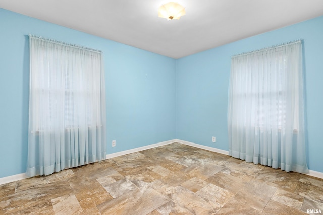 2400 W Callender Ave, West Peoria, IL 61610 - empty room featuring stone finish floors