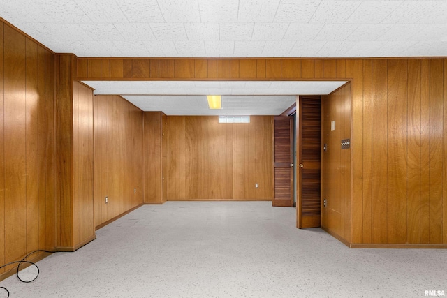 2400 W Callender Ave, West Peoria, IL 61610 - basement with wood walls and baseboards