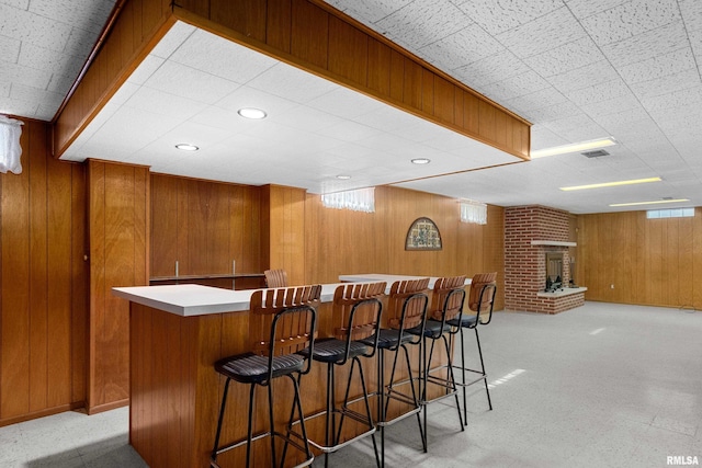 2400 W Callender Ave, West Peoria, IL 61610 - indoor dry bar with wooden walls and a fireplace