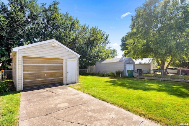 2400 W Callender Ave, West Peoria, IL 61610 - detached garage featuring driveway