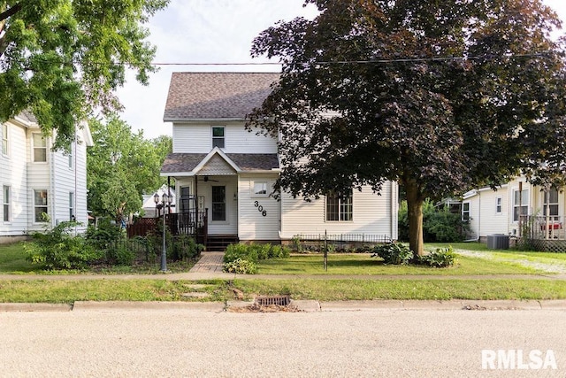 306 W Fremont St, Elmwood, IL 61529 - view of front of house with roof with shingles and covered porch