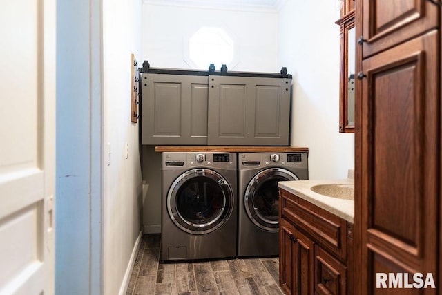 306 W Fremont St, Elmwood, IL 61529 - laundry area with washer and dryer, cabinet space, and dark wood finished floors