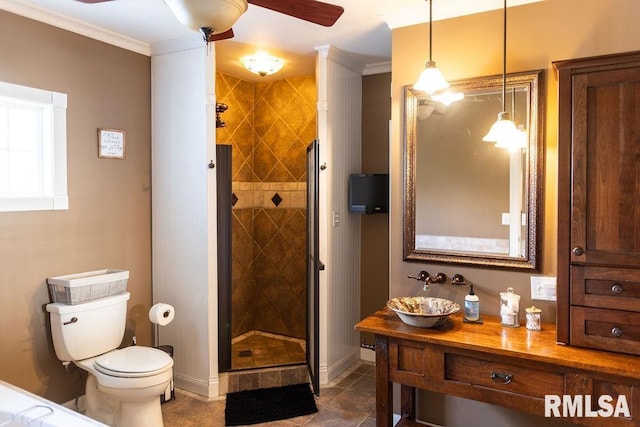 306 W Fremont St, Elmwood, IL 61529 - bathroom featuring a ceiling fan, a shower stall, ornamental molding, tile patterned flooring, and vanity