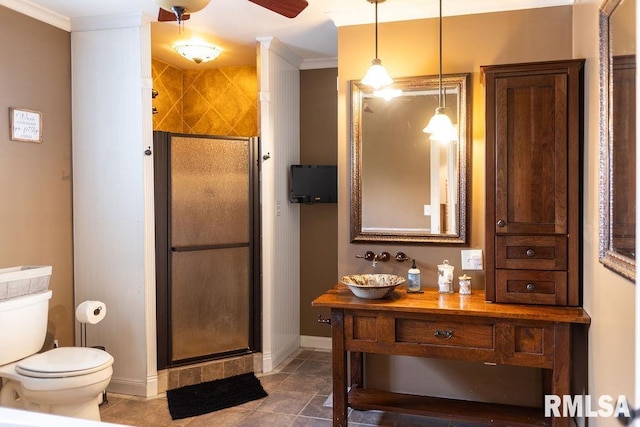 306 W Fremont St, Elmwood, IL 61529 - bathroom featuring a shower stall, ornamental molding, ceiling fan, and vanity