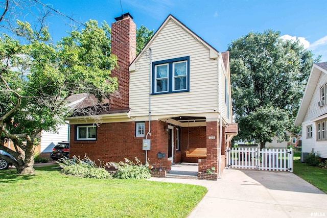 1926 W Callender Ave, West Peoria, IL 61604 - view of front of property with a chimney and brick siding