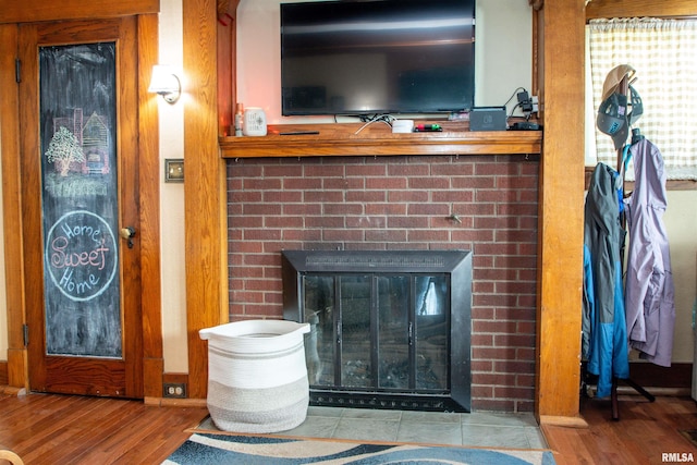 1926 W Callender Ave, West Peoria, IL 61604 - detailed view of wood finished floors and a fireplace