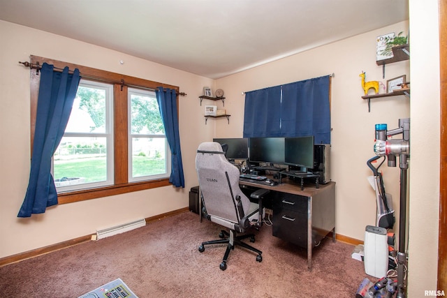 1926 W Callender Ave, West Peoria, IL 61604 - carpeted office space featuring a baseboard heating unit and baseboards