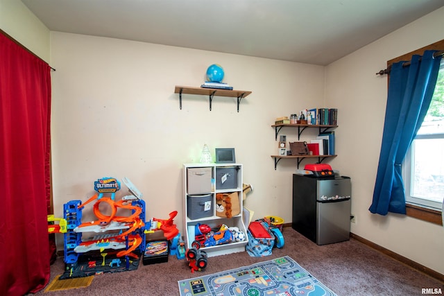 1926 W Callender Ave, West Peoria, IL 61604 - recreation room featuring carpet flooring and baseboards