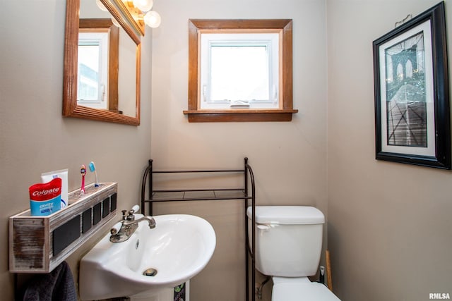 1926 W Callender Ave, West Peoria, IL 61604 - half bathroom with a sink and toilet