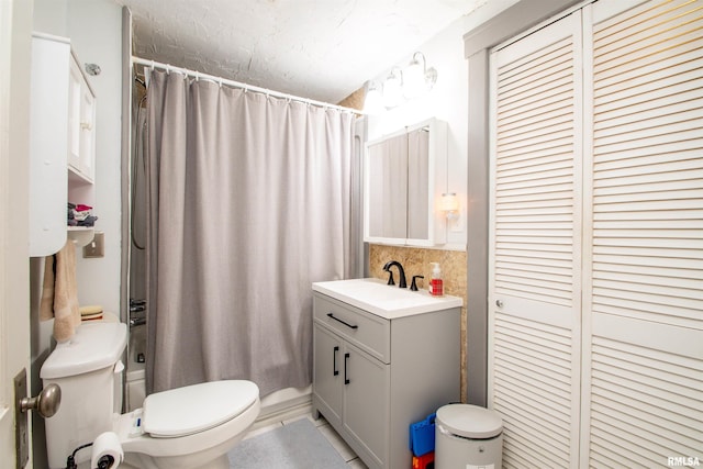 1926 W Callender Ave, West Peoria, IL 61604 - bathroom with vanity and a closet