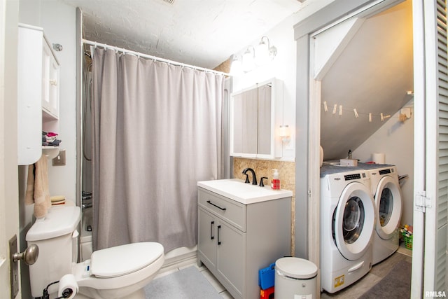 1926 W Callender Ave, West Peoria, IL 61604 - full bathroom with washing machine and dryer, vanity, and curtained shower