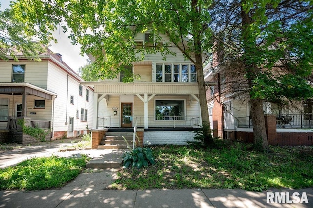 1121 N University St, Peoria, IL 61606 - view of front of property featuring a porch