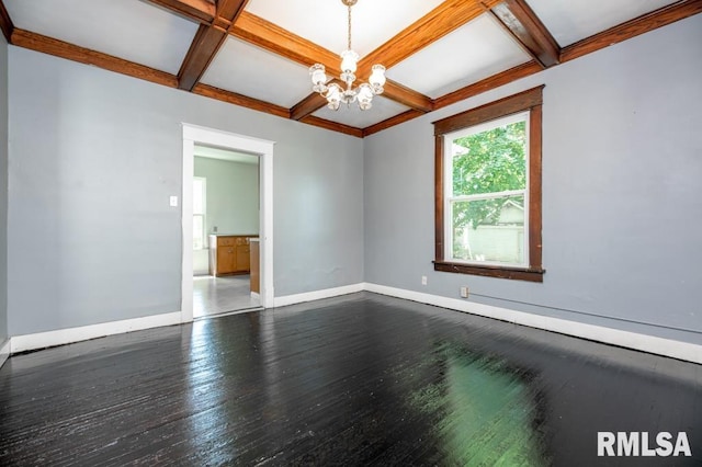 1121 N University St, Peoria, IL 61606 - empty room with a chandelier, coffered ceiling, dark wood-type flooring, and beam ceiling