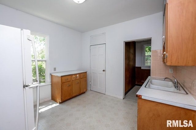 1121 N University St, Peoria, IL 61606 - kitchen featuring healthy amount of natural light and light countertops