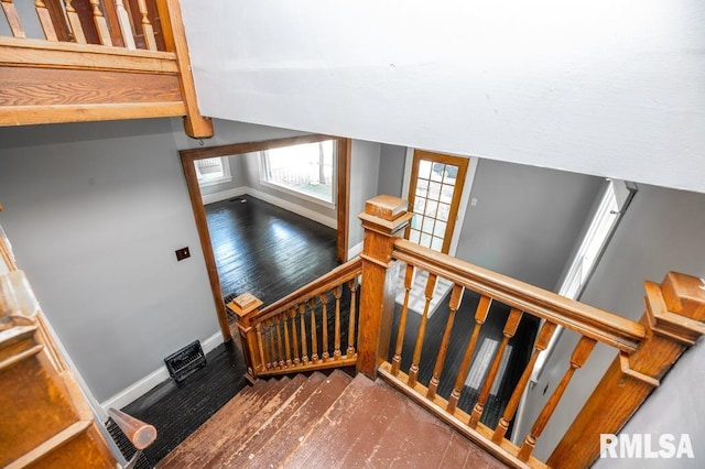 1121 N University St, Peoria, IL 61606 - staircase with wood-type flooring and baseboards