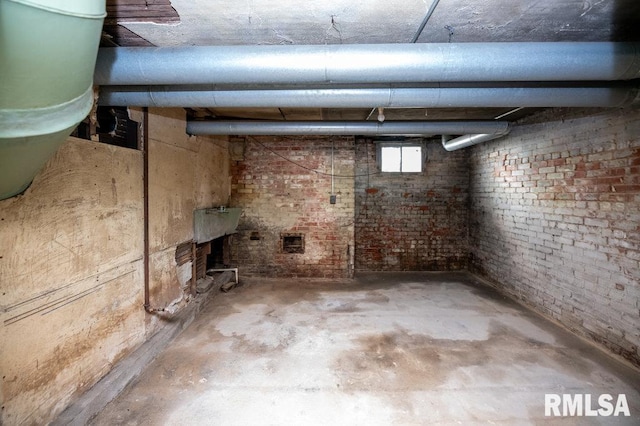 1121 N University St, Peoria, IL 61606 - below grade area with brick wall