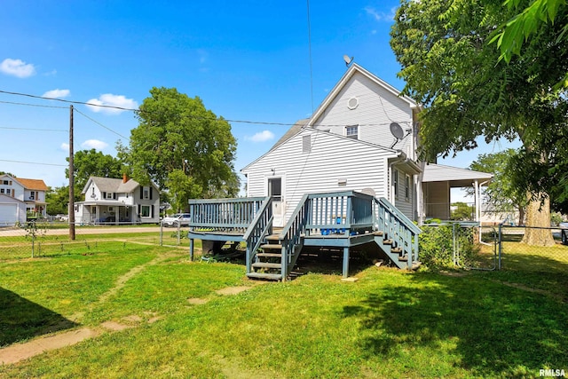 1029 N Santa Fe Ave, Chillicothe, IL 61523 - rear view of property featuring a wooden deck and stairs