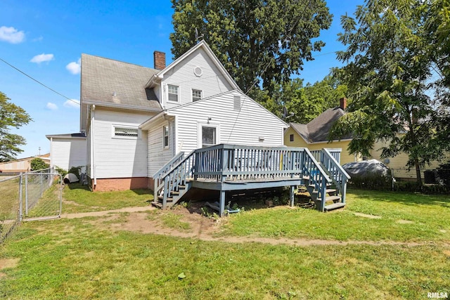 1029 N Santa Fe Ave, Chillicothe, IL 61523 - rear view of property with a wooden deck, a chimney, stairs, a gate, and a shingled roof