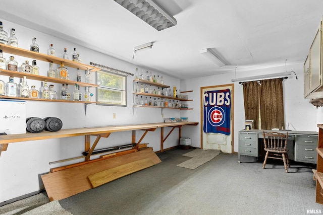 1029 N Santa Fe Ave, Chillicothe, IL 61523 - garage featuring a desk