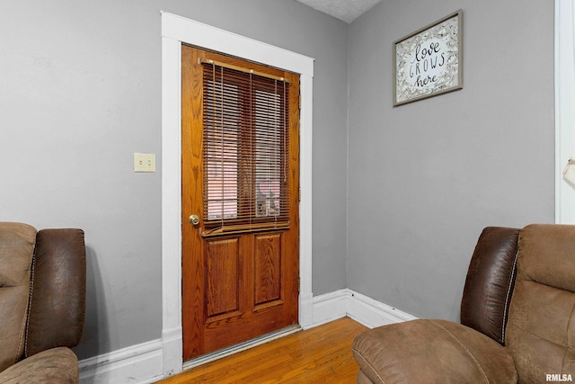 1029 N Santa Fe Ave, Chillicothe, IL 61523 - sitting room with wood finished floors and baseboards