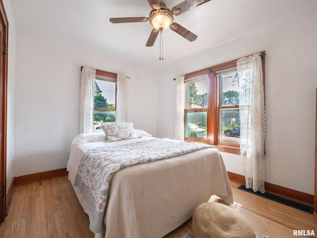 1108 Summer St, Pekin, IL 61554 - bedroom featuring light wood-type flooring and ceiling fan
