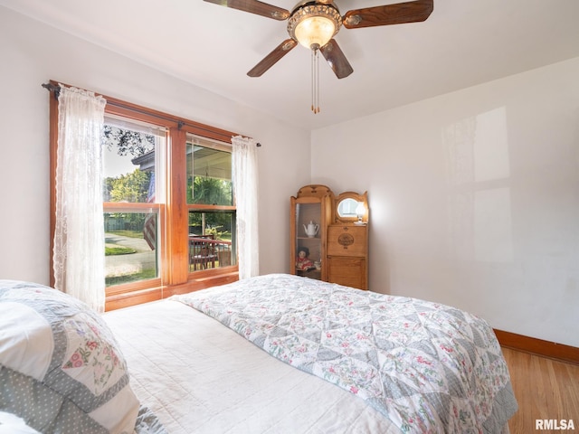 1108 Summer St, Pekin, IL 61554 - bedroom featuring wood finished floors and ceiling fan