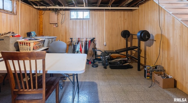 1108 Summer St, Pekin, IL 61554 - workout area featuring tile patterned floors, wooden walls, and electric panel