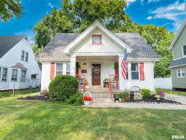 1108 Summer St, Pekin, IL 61554 - bungalow-style house featuring covered porch