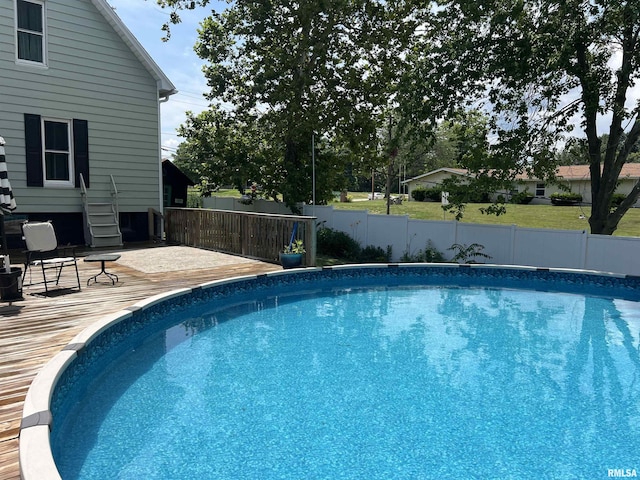 236 W Grant St, Macomb, IL 61455 - view of swimming pool with a deck and a fenced backyard