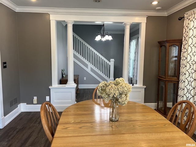 236 W Grant St, Macomb, IL 61455 - dining area with dark wood-style flooring, crown molding, a chandelier, decorative columns, and recessed lighting