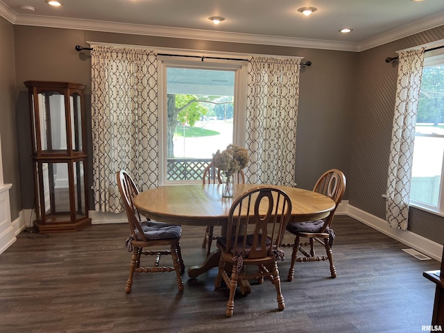236 W Grant St, Macomb, IL 61455 - dining room with wood finished floors and ornamental molding