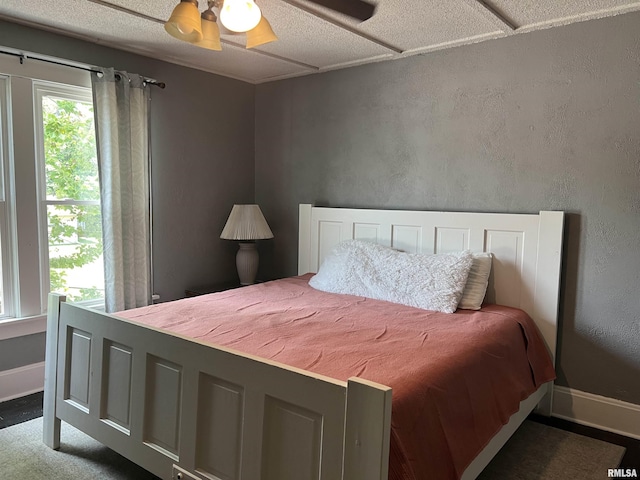 236 W Grant St, Macomb, IL 61455 - bedroom with baseboards and ceiling fan