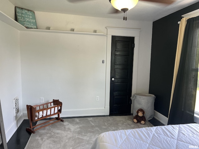 236 W Grant St, Macomb, IL 61455 - carpeted bedroom featuring baseboards and ceiling fan