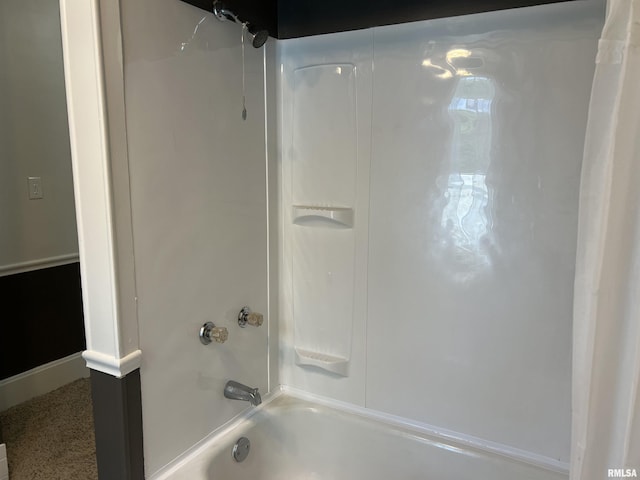 236 W Grant St, Macomb, IL 61455 - bathroom featuring bathing tub / shower combination and baseboards