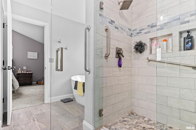 824 Debates St, Washington, IL 61571 - bathroom with a shower stall and vaulted ceiling