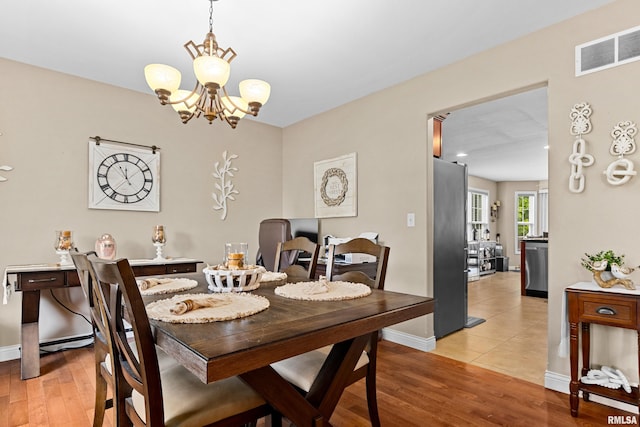 824 Debates St, Washington, IL 61571 - dining area featuring a chandelier, light wood finished floors, and recessed lighting