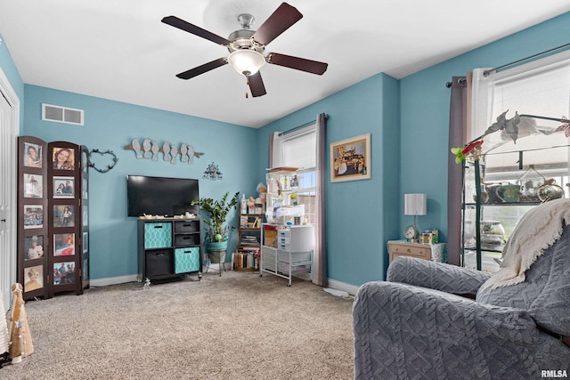 824 Debates St, Washington, IL 61571 - living area with carpet and ceiling fan