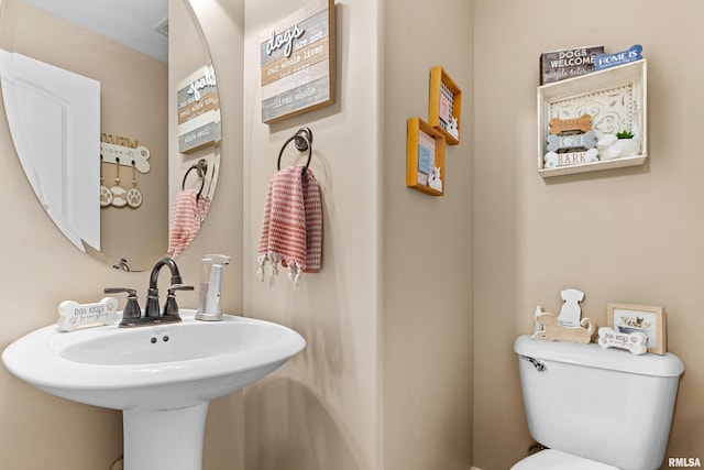 824 Debates St, Washington, IL 61571 - half bathroom with a sink and toilet
