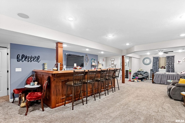 824 Debates St, Washington, IL 61571 - indoor bar with light colored carpet, ornate columns, recessed lighting, a ceiling fan, and a textured ceiling