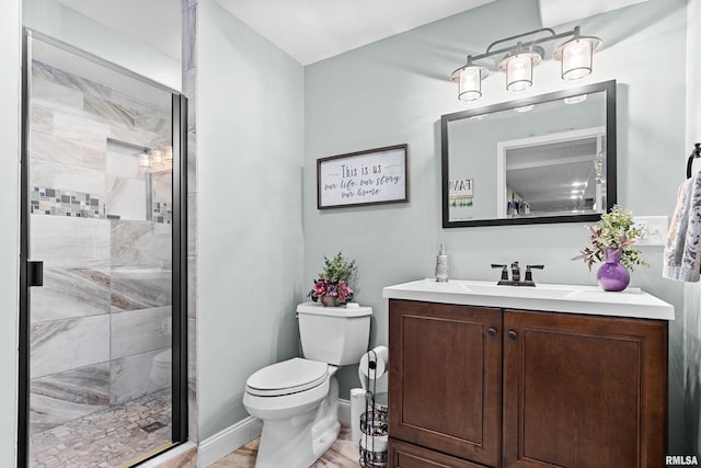 824 Debates St, Washington, IL 61571 - bathroom featuring vanity, a stall shower, and wood finished floors