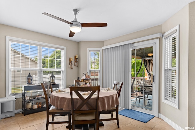 824 Debates St, Washington, IL 61571 - dining room with ceiling fan and light tile patterned floors