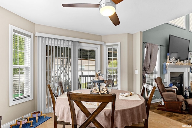 824 Debates St, Washington, IL 61571 - dining area featuring ceiling fan, plenty of natural light, and light tile patterned floors