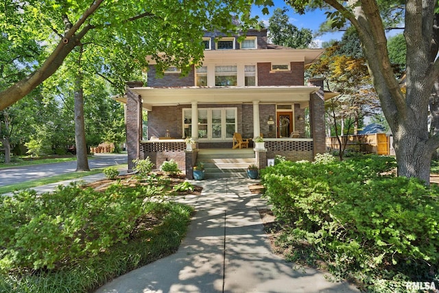 1227 W Barker Ave, Peoria, IL 61606 - traditional style home with brick siding and a porch