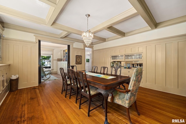 1227 W Barker Ave, Peoria, IL 61606 - dining space with a decorative wall, a chandelier, coffered ceiling, wood finished floors, and beam ceiling