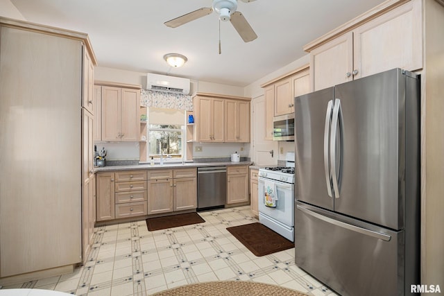 1227 W Barker Ave, Peoria, IL 61606 - kitchen featuring appliances with stainless steel finishes, light brown cabinetry, a wall mounted air conditioner, light floors, and open shelves