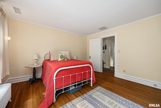 1227 W Barker Ave, Peoria, IL 61606 - bedroom with wood finished floors and ornamental molding